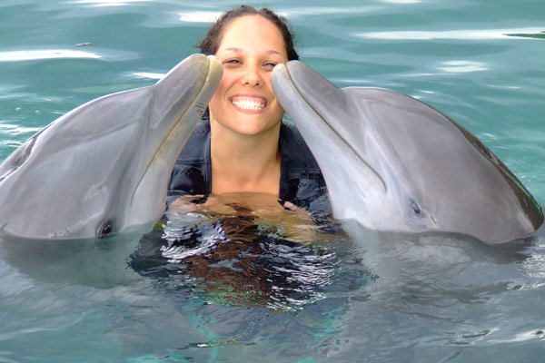 Laura with two new friends she made in Jamaica