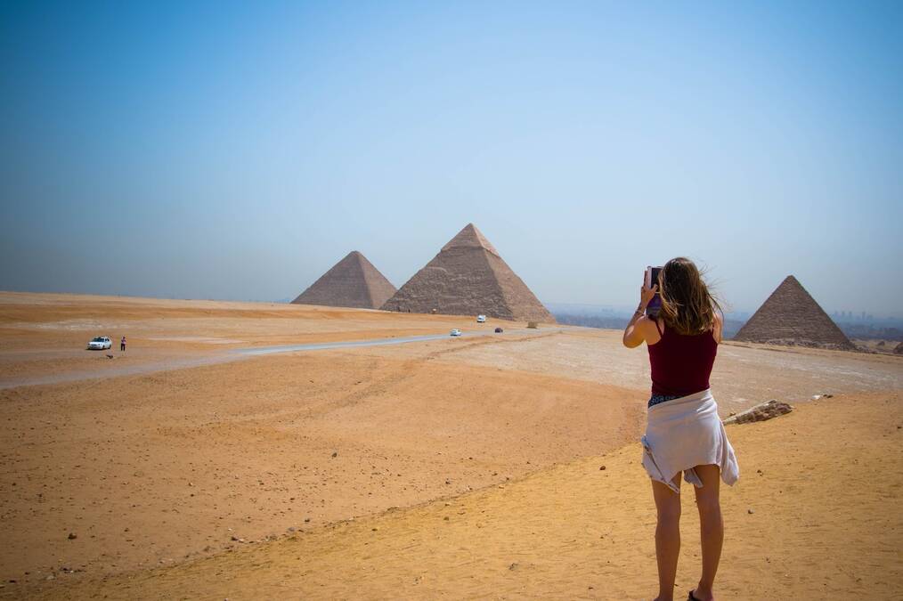 Gap Year in Egypt: Woman Photographing Pyramids