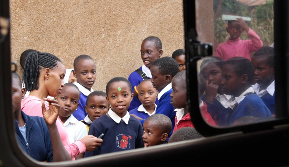 The Voluntourist's Dilemma - Children through Window