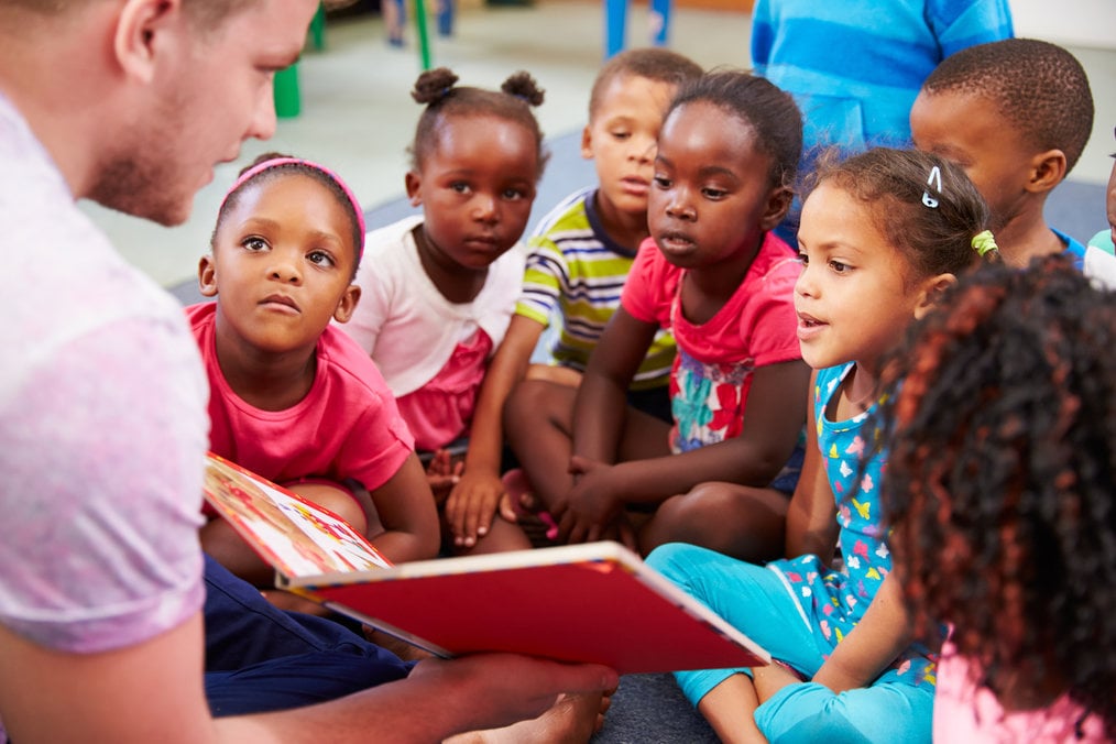 How to Get a Teaching Job - Man Reading to Students