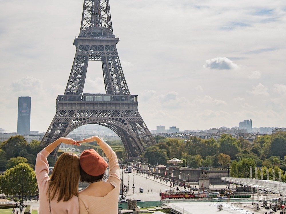 Know Before Studying Abroad in France - Girls in France near Eiffel Tower
