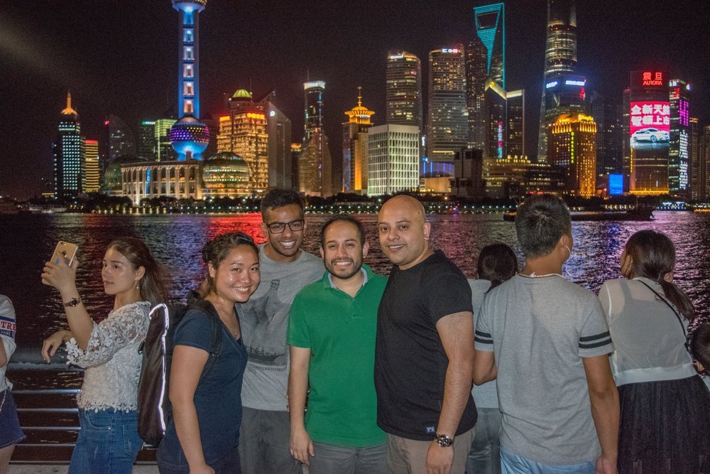 Photo by Kara, ImmerQi Shanghai Group of interns posing in downtown Shanghai.