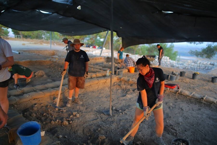 Photo by Rachel K., Tel Aviv University Israel Two people working on an archaelogical dig.