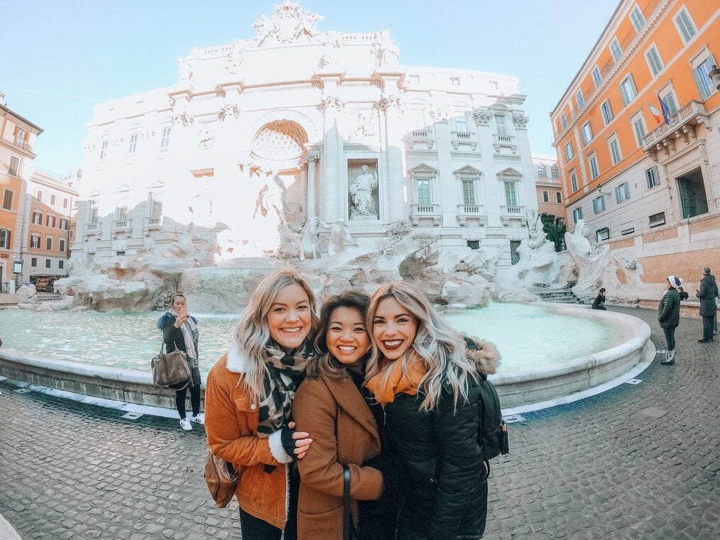 Group of friends smiling in Rome