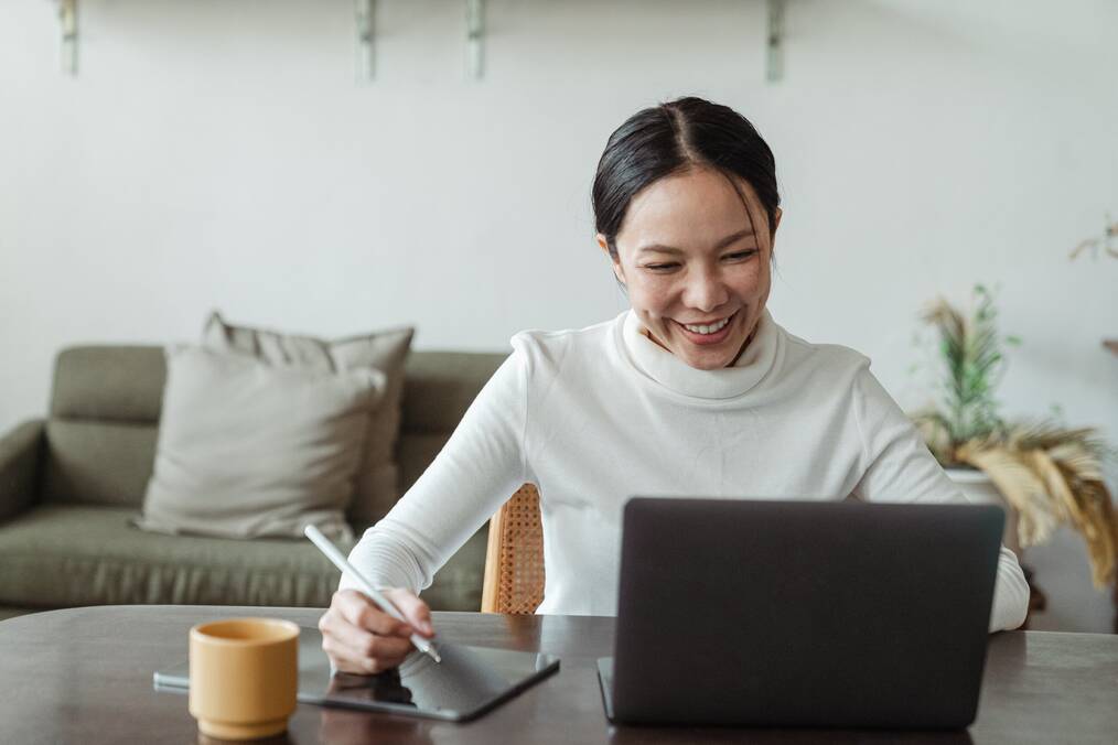 Girl researching at laptop