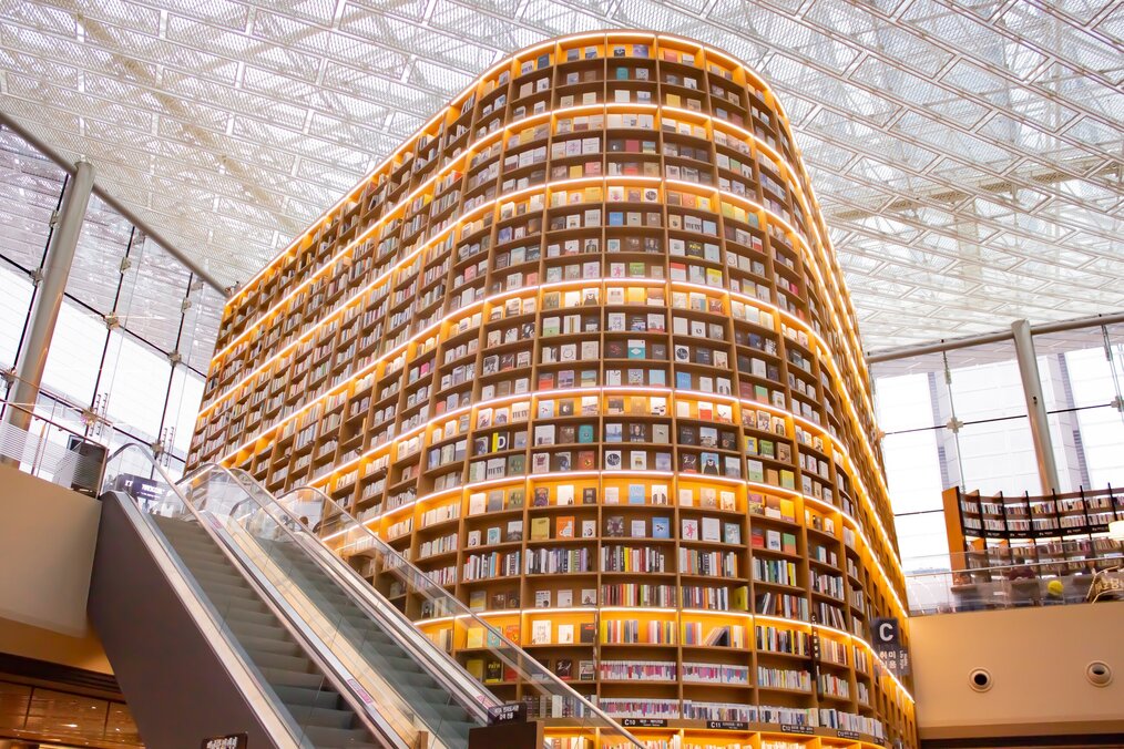Books displayed in a large shelf in famous library in South Korea