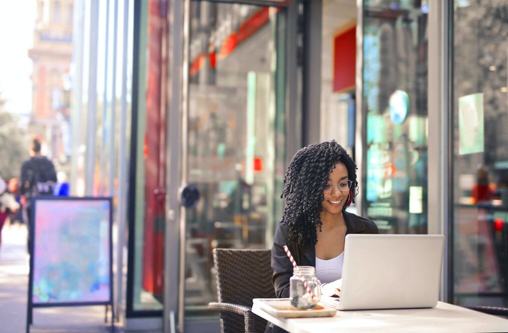 Person studying outside on a laptop