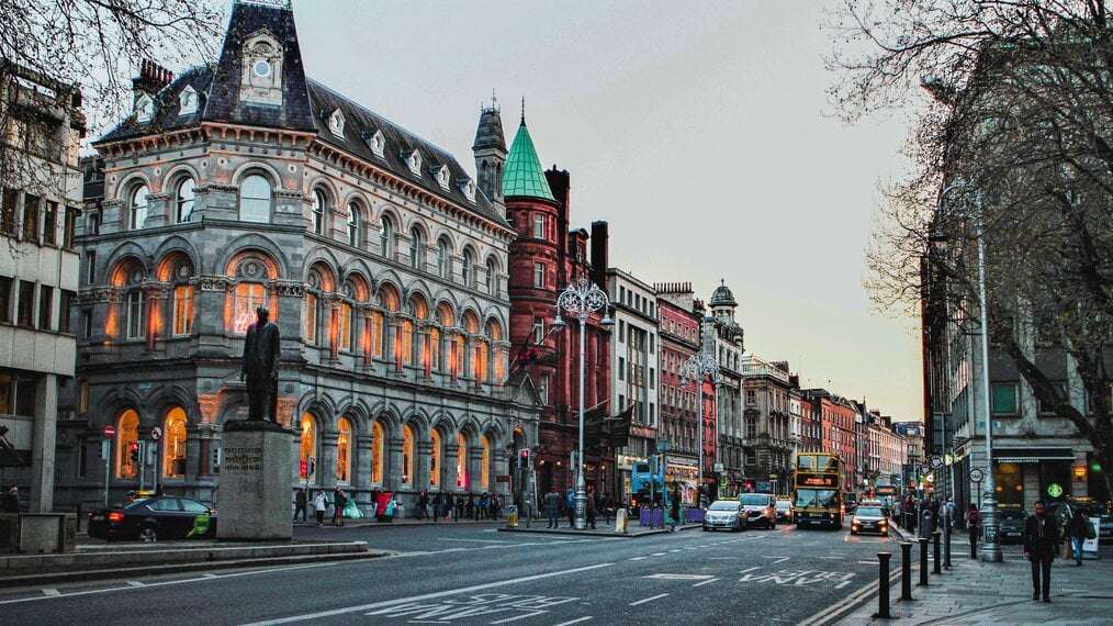 Buildings on a street in Dublin at dusk.