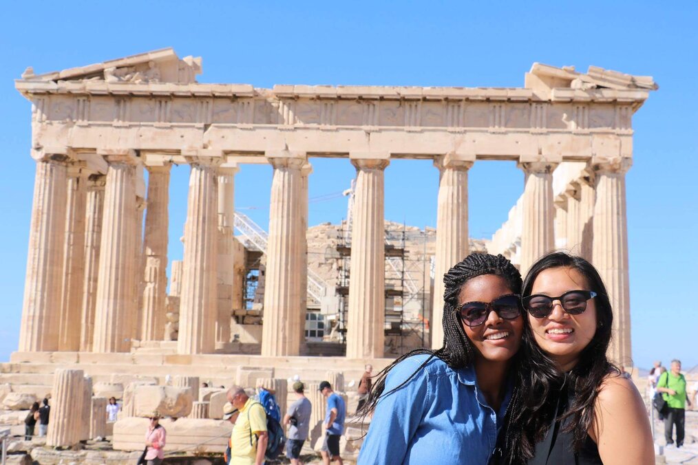 Daryn R., John Felice Rome Center Alumni Two women smiling in front of Rome Center in Greece