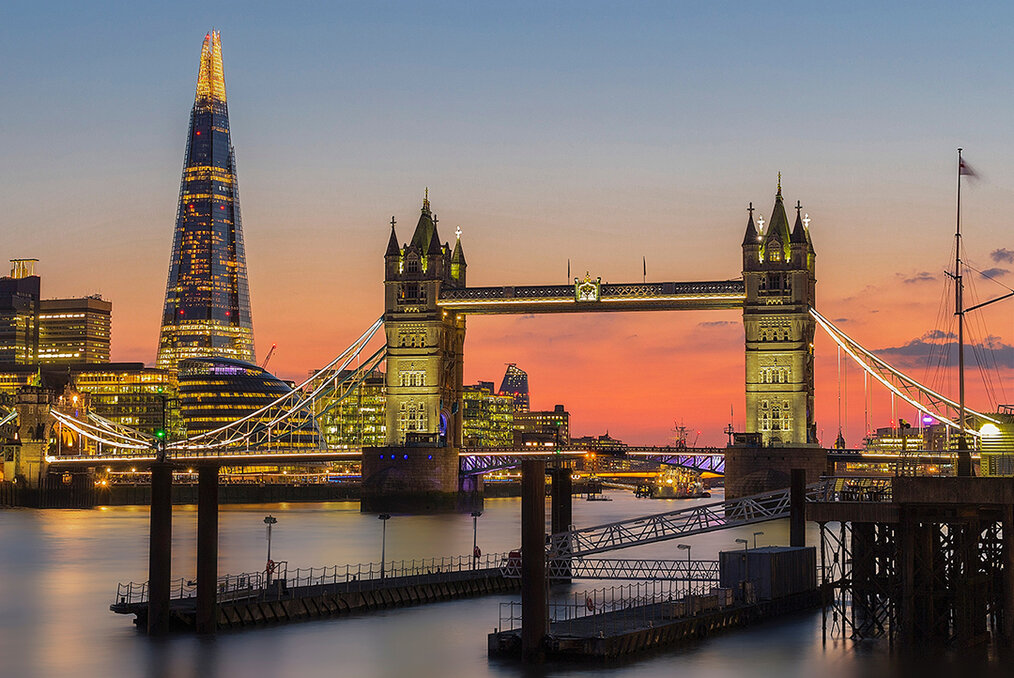 A sunset photo of a Tower Bridge