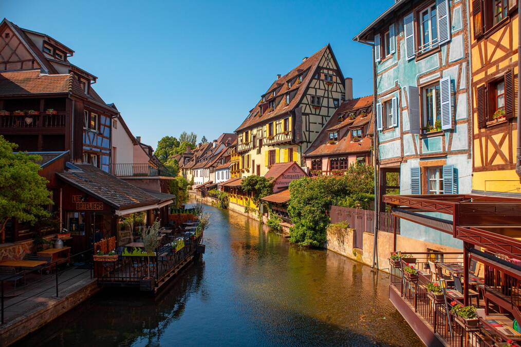 Colorful buildings along a canal in Strasbourg, France.