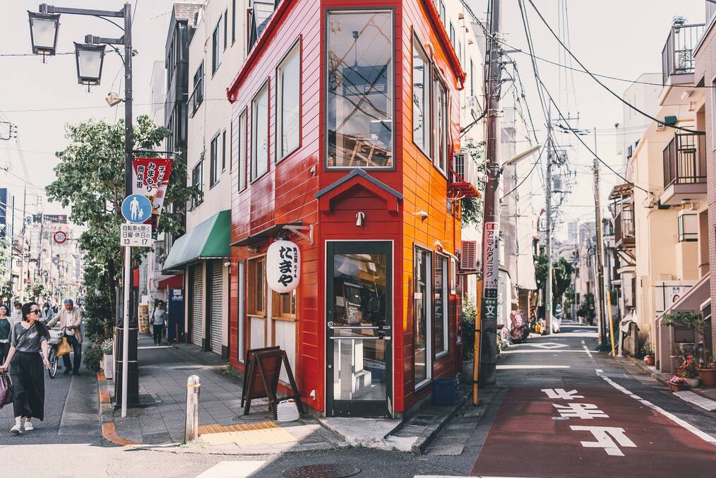 the front of a storefront on a street in Japan
