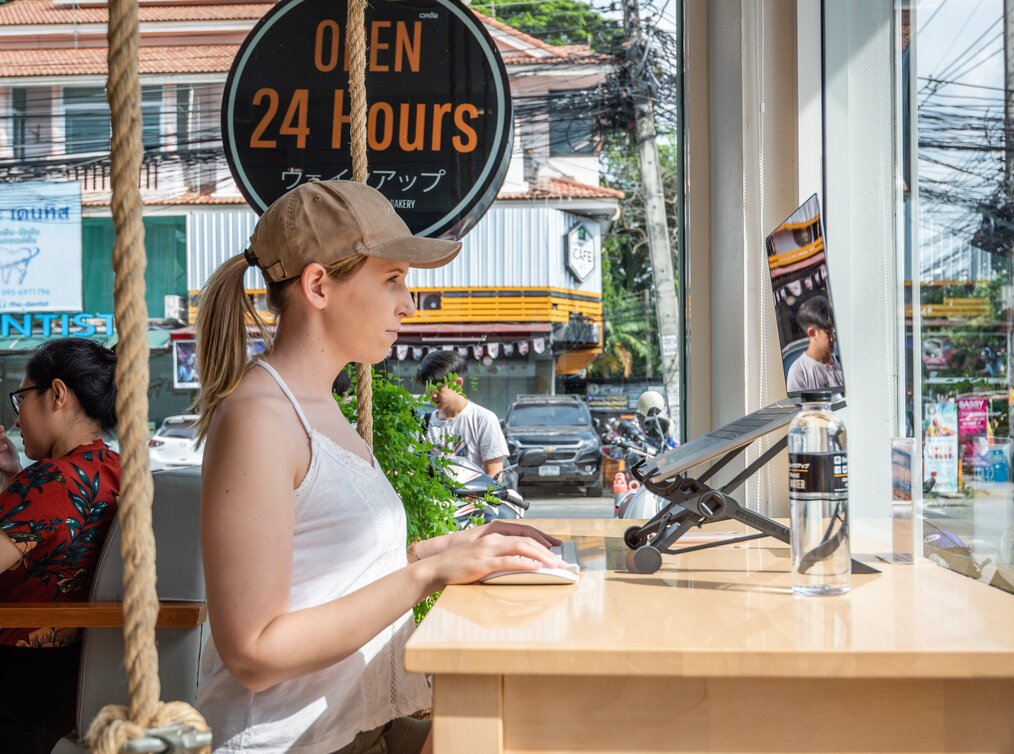 Image curtesy of Samantha Eaton, Unsplash a remote worker on her laptop at a cafe