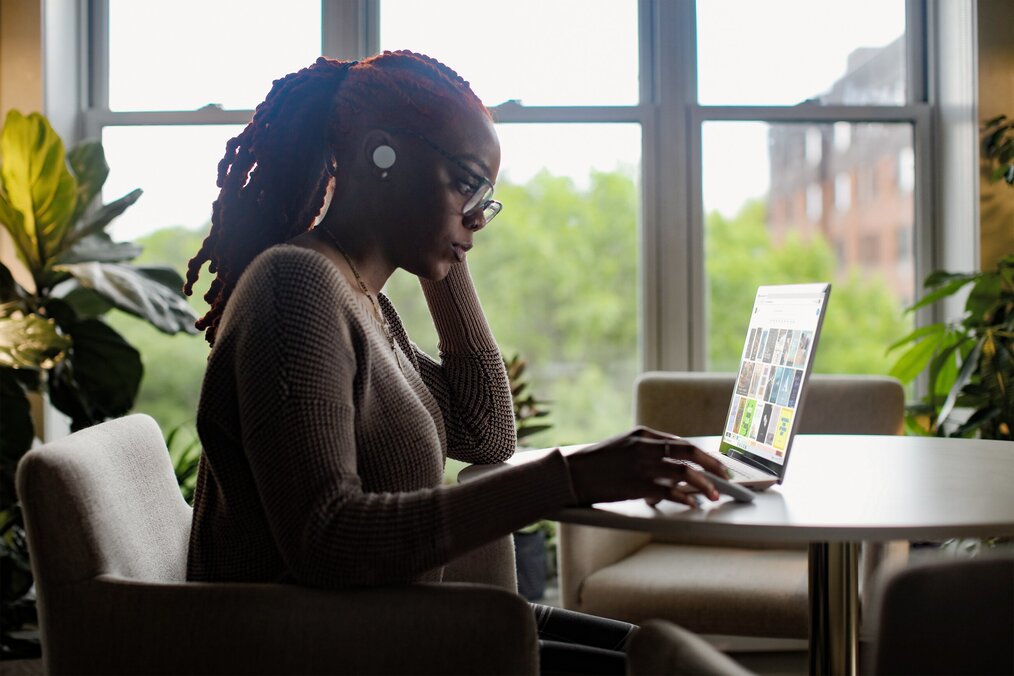 Image curtesy of Surface, Unsplash A social media and community manager on her computer