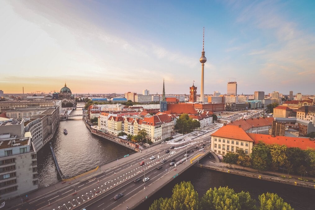 Photo by Florian Wehde on Unsplash A city with a river running through it.