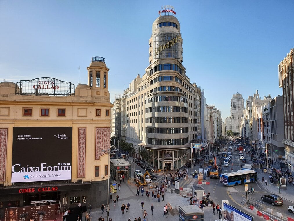 Photo by Giuseppe Buccola on Unsplash Large buildings on Gran Via in Madrid.