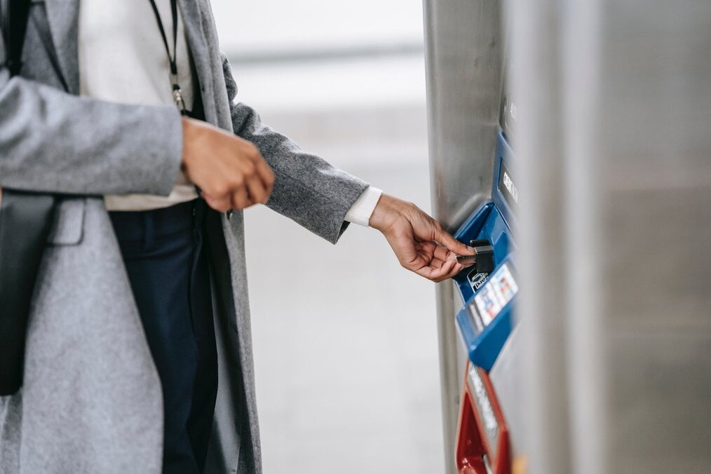Image curtesy of Ono Kosuki, Pexels A student using an ATM with a card
