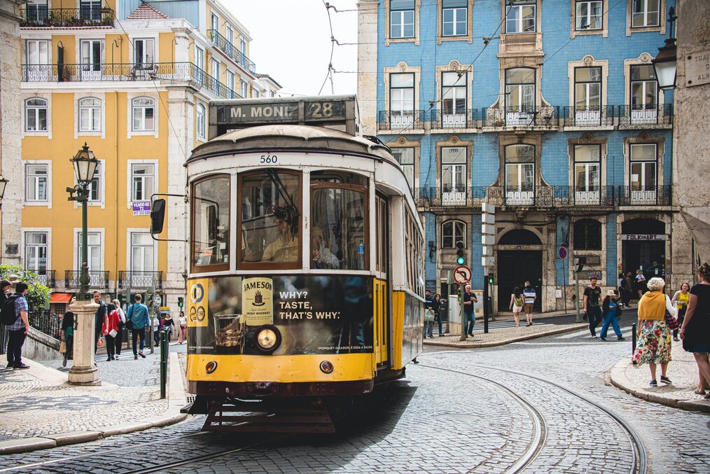 A cable car stands on the street in Lisbon, Portugal.