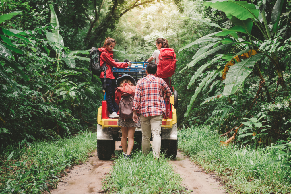Group of people riding a jeep
