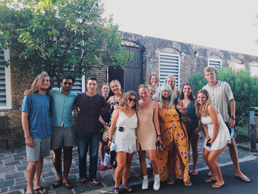 Group of travelers smiling together