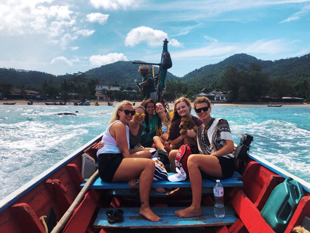 Samantha P., Gapforce Thailand alum Samantha P. on a boat in Thailand with other gap year students