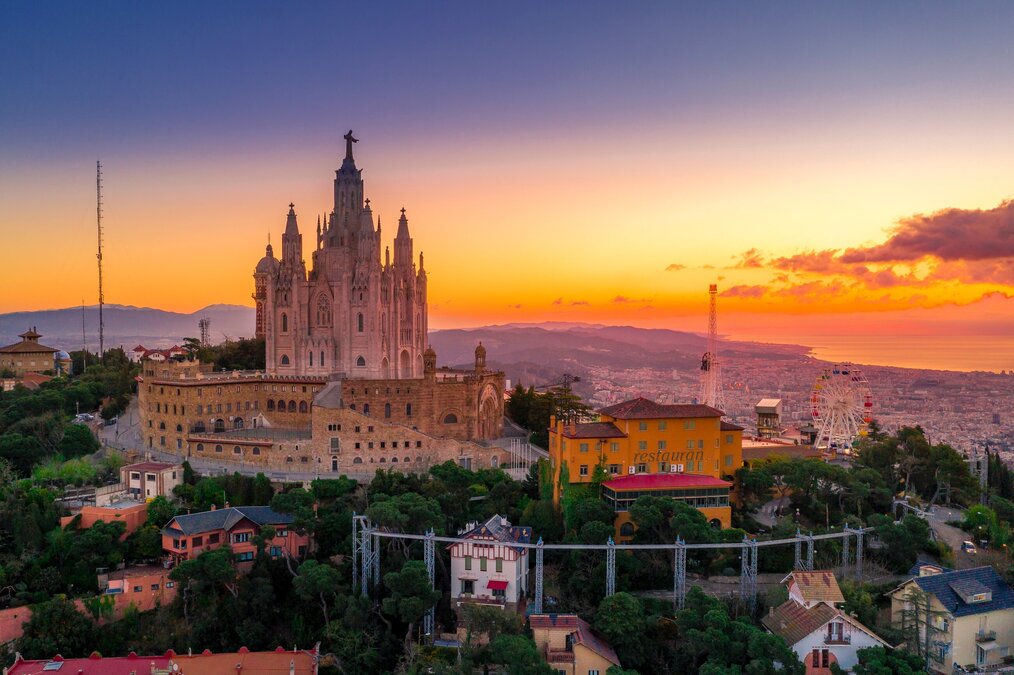 Photo by Ken Cheung on Unsplash Buildings in Barcelona at sunset.