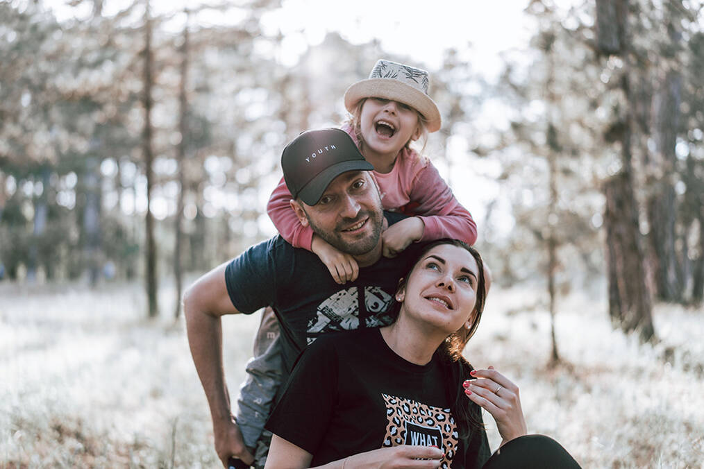 A family hiking in the snow
