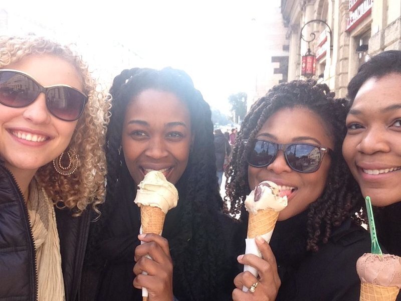 IES Three women pose with ice cream cones.
