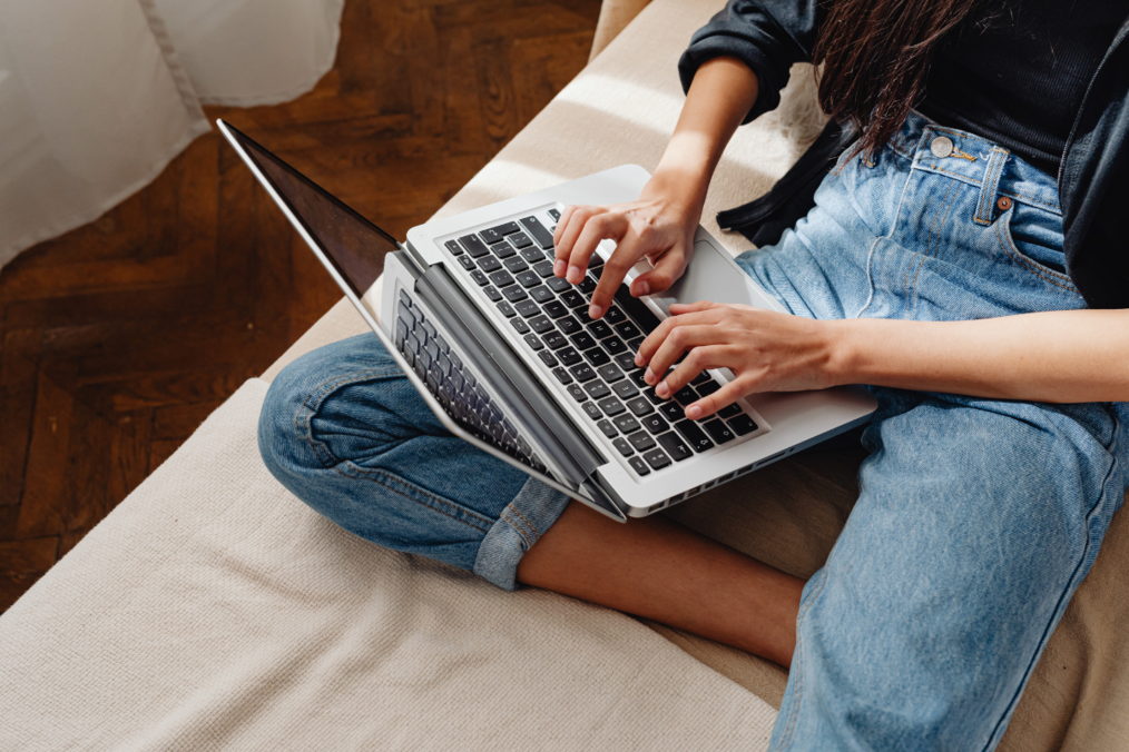 Woman typing on laptop