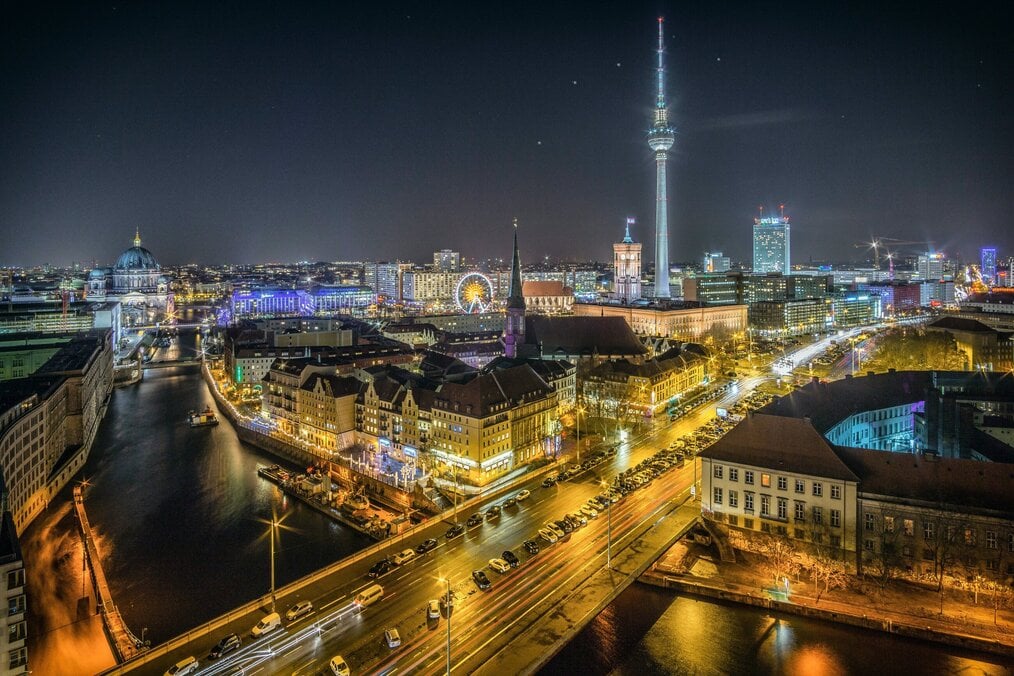 Photo by Martin on Unsplash A drone view of Berlin at night.
