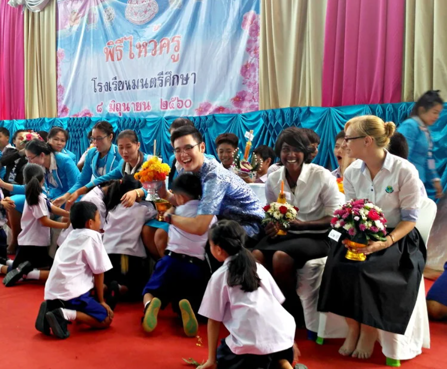English teacher greeted by students in Thailand