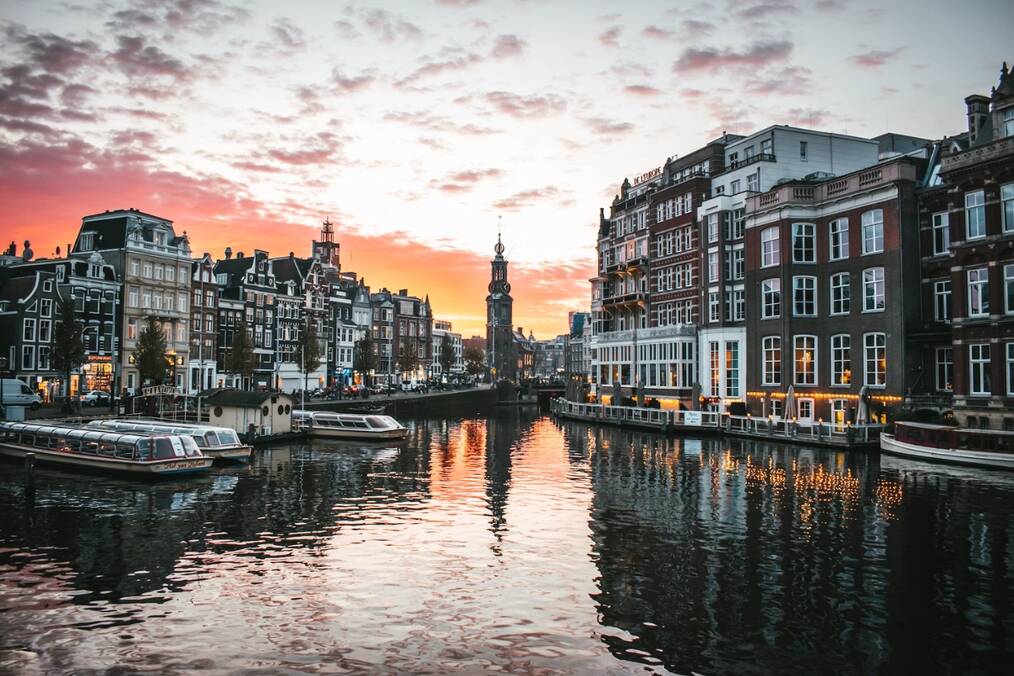 Sunset over the canal in Amsterdam in the Netherlands