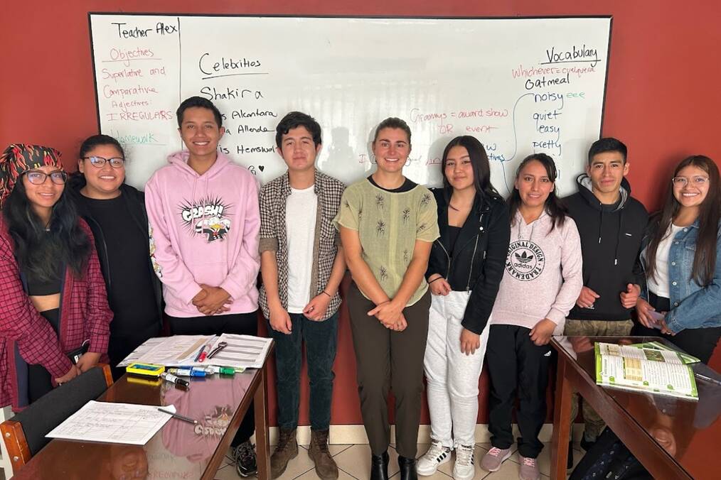 A TEFL teacher and their students in the ESL classroom