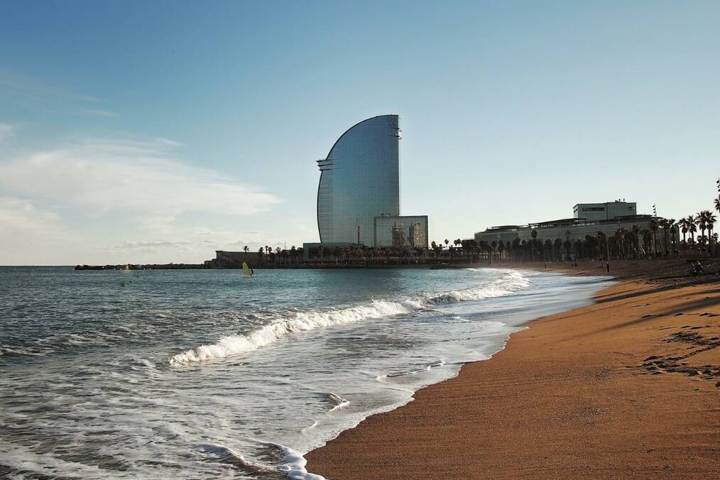 Beach and modern building in Barcelona, Spain