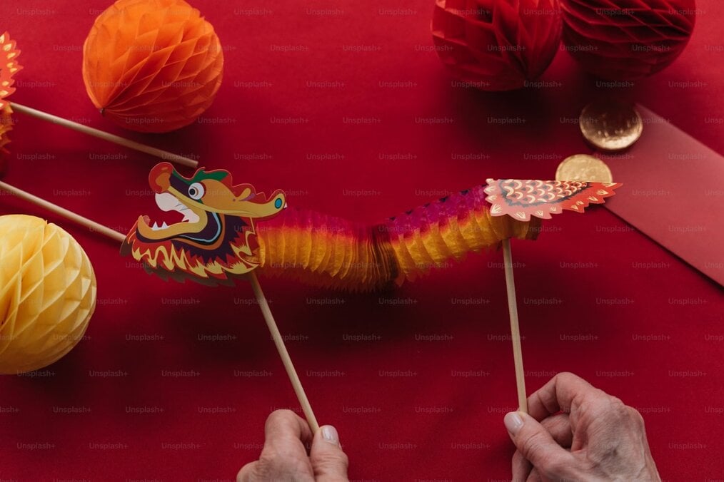 Chinese dragon puppet A person holding a Chinese Dragon puppet