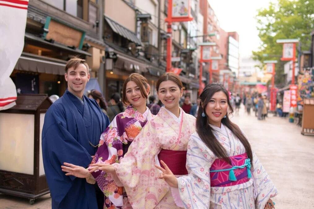 A group of friends in Japan wearing the traditional kimono