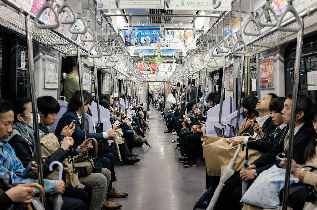 A busy subway car in Japan.
