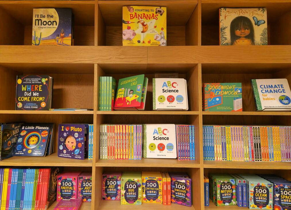 A bookshelf filled with children's books.