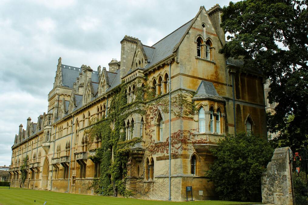 A historic building covered in ivy on the Oxford campus.