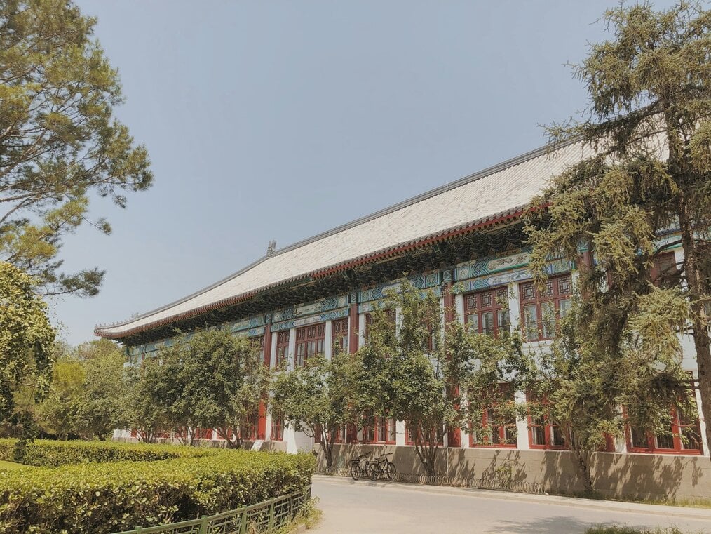 Photo by Markus Leo on Unsplash A large building on the Peking University campus in China.