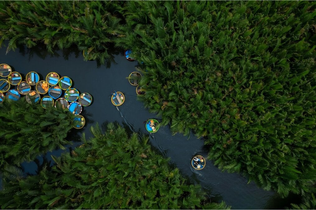 River boat tour in Hoi An, Vietnam Aerial view of a river boat tour in Hoi An, Vietnam