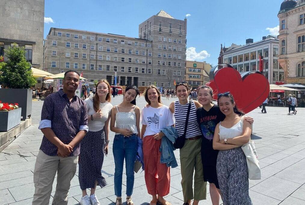 A group of people pose for a picture in Berlin.