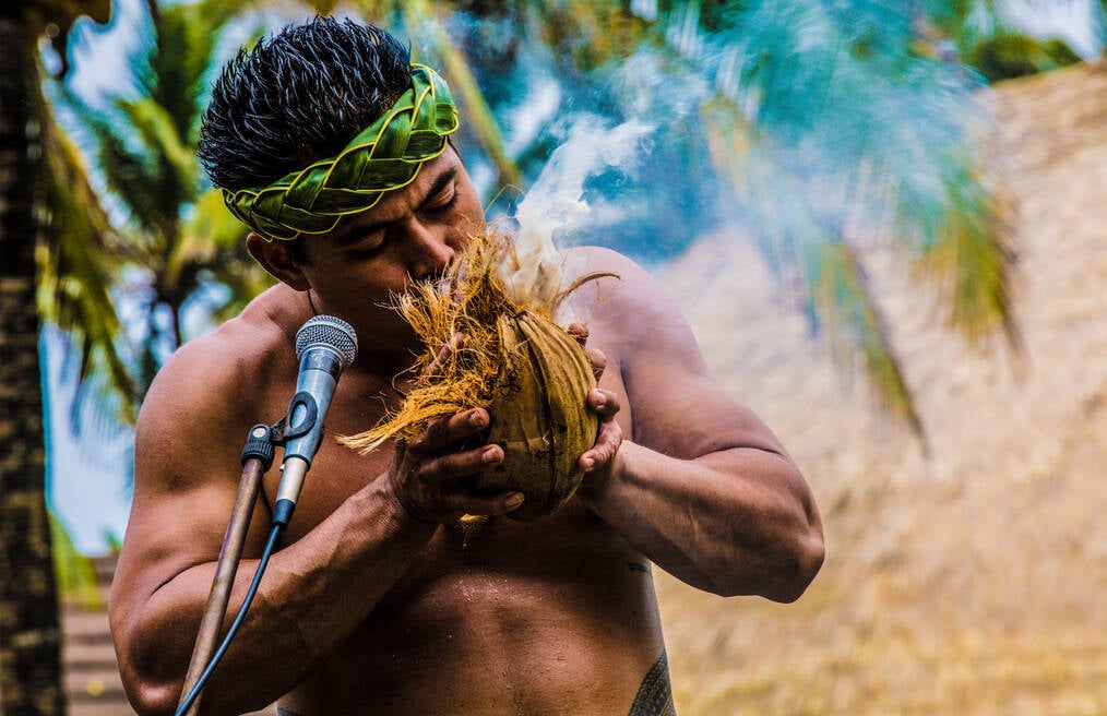 A man performing a cultural ritual