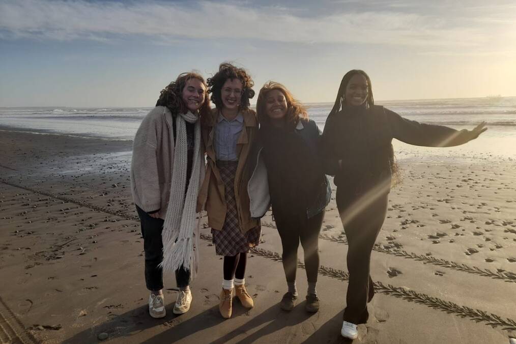 Four friends on the beach 
