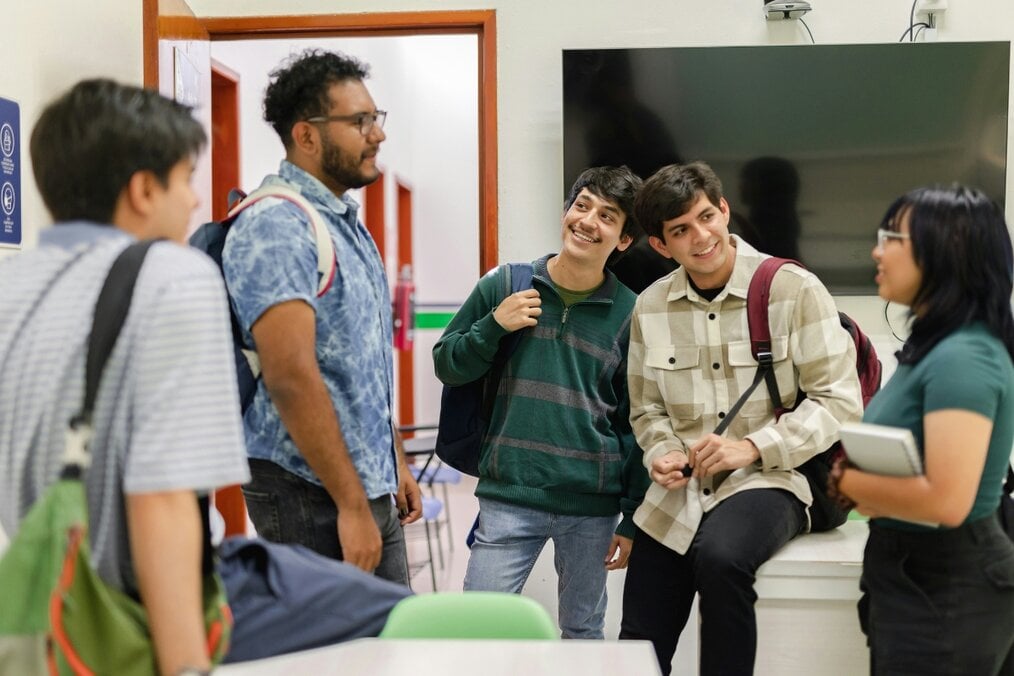 How to study abroad in your first year A group of students talking after class