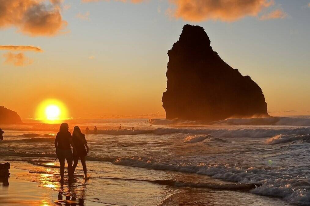 A rocky island during a sunset 