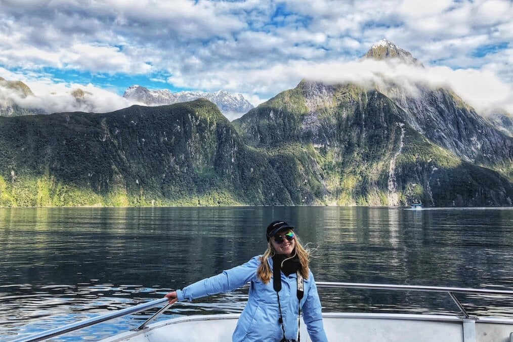 Emily, Victoria University of Wellington New Zealand A person posing on a lake near a mountain