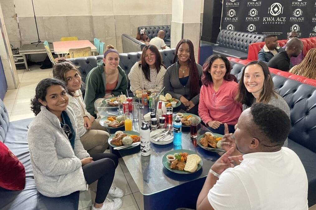 A group of friends having a meal at a restaurant