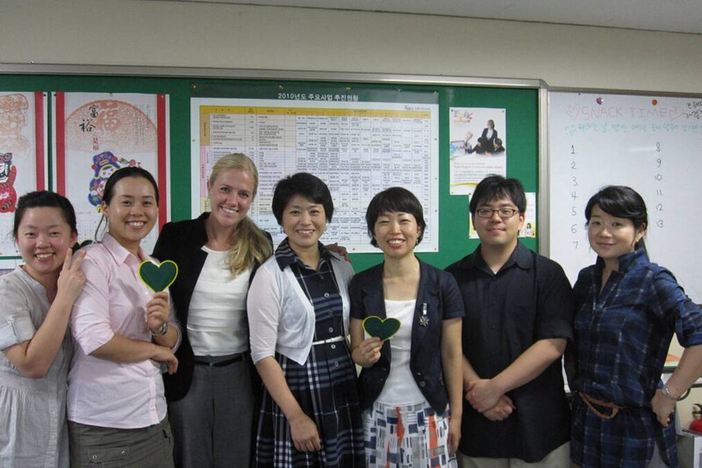 A foreign teacher with their Korean co-teachers