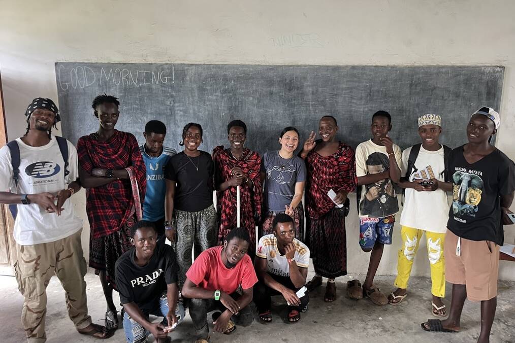 A foreign teacher with native students in the classroom
